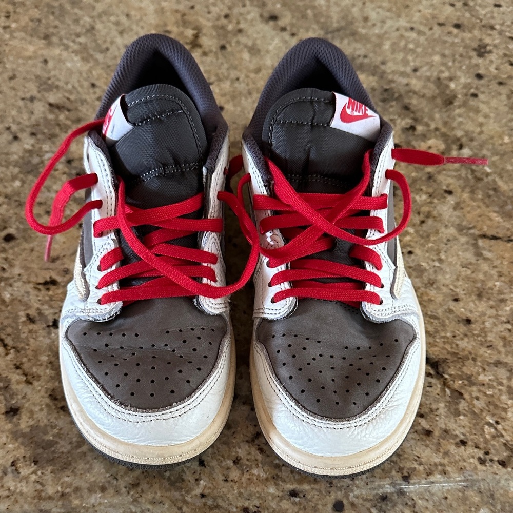 Nike Kids Sneakers - White and Gray with Red Accents
Travis Scott